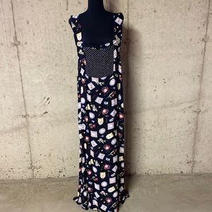 Maxi jumper multi colored with polka dot pocket and Mop buttons.